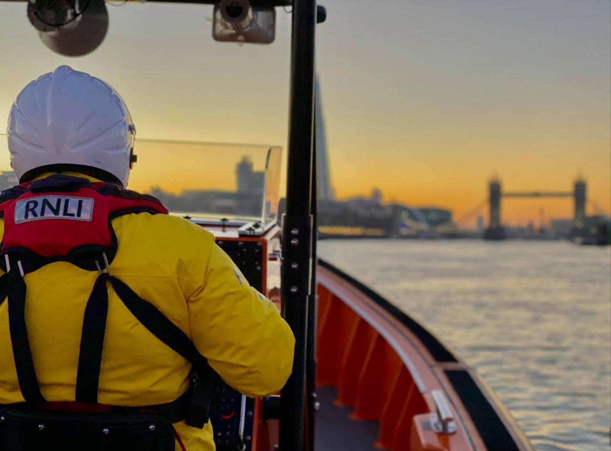 Crew gave first aid to person in water by HMS Belfast